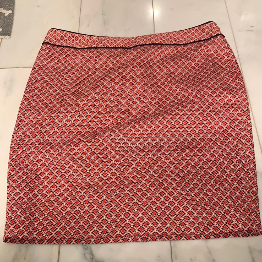 Orange, white, and black pencil skirt.
